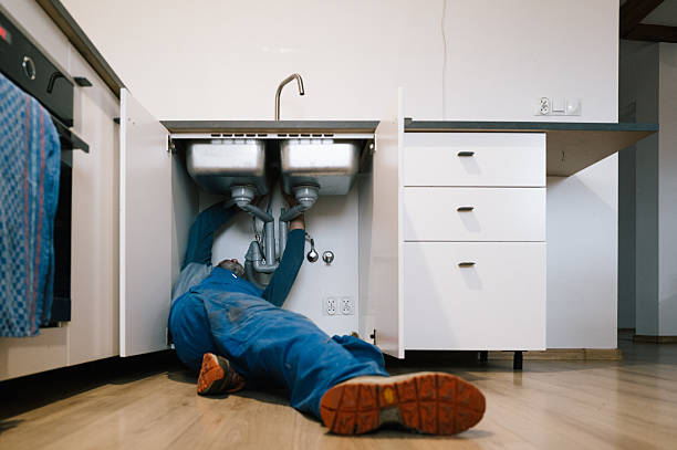 Professional Drain Cleaning technician working in Grahn, KY